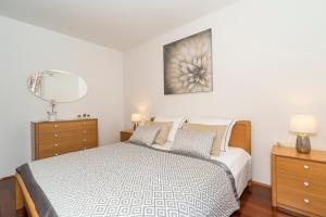 Posteľ alebo postele v izbe v ubytovaní Apartment in OLD TOWN with CITY VIEW