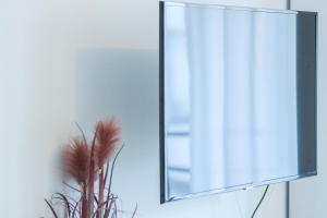 TV a/nebo společenská místnost v ubytování Il Mare appart hotel 1,2,4