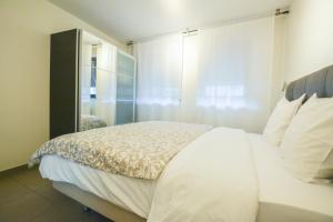 Postel nebo postele na pokoji v ubytování Il Mare appart hotel 1,2,4