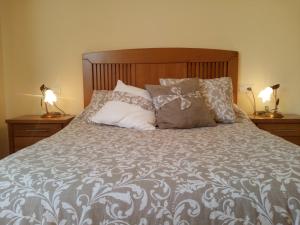 Postel nebo postele na pokoji v ubytování Casa Rural Las Nieves