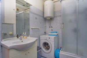 Kúpeľňa v ubytovaní Apartments Žerjav