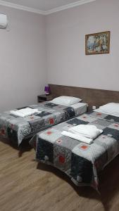 Voodi või voodid majutusasutuse Hotel Giorgi toas