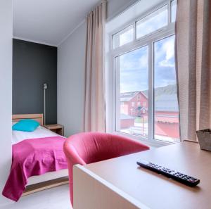 Postel nebo postele na pokoji v ubytování Melbu Hotell