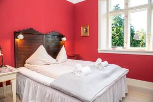 Ліжко або ліжка в номері Fuglsang Herregaard Hotel