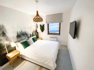 Postel nebo postele na pokoji v ubytování Ostoja Bukowinki - Peniński Las + 19 fotografií