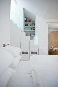 Postel nebo postele na pokoji v ubytování Boutique Hotel Imperialart
