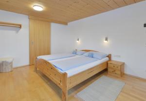 Posteľ alebo postele v izbe v ubytovaní Pension Haus Romy