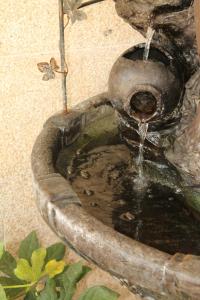 a water faucet that is in a sink at Loop INN Hotel Santiago de Compostela in Santiago de Compostela