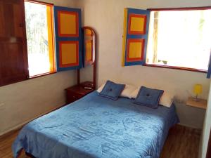 Postel nebo postele na pokoji v ubytování Hostal Encanto La Salada + 15 fotografií
