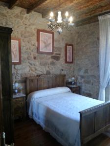 Postel nebo postele na pokoji v ubytování Casa Rua