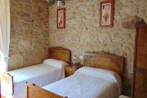 Postel nebo postele na pokoji v ubytování Casa Rua