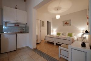 Kuchyň nebo kuchyňský kout v ubytování Eftyxia apartments