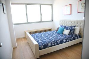 Cama o camas de una habitación en Villa Blau de Lluna
