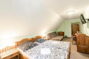 Rúm í herbergi á Hotel Perla Jizery