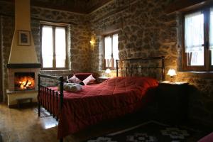 Posteľ alebo postele v izbe v ubytovaní Pigi Tarlampa Hotel