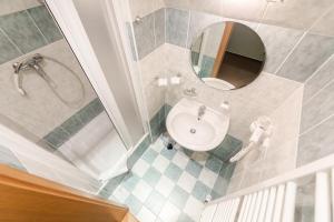 Baðherbergi á Hotel Perla Jizery