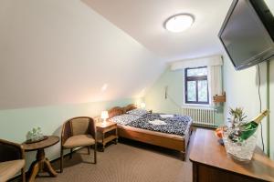 Rúm í herbergi á Hotel Perla Jizery