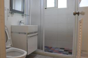 Un baño de Yu Shou Hao Hsien Guesthouse
