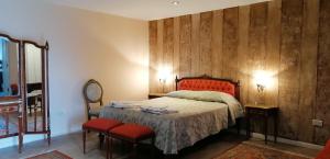Ліжко або ліжка в номері Malva Suite