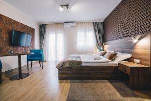 Una cama o camas en una habitación de Filips Sleep