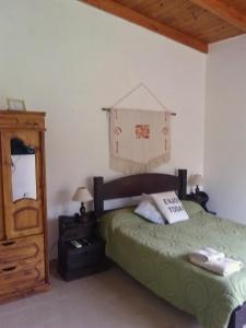 Postel nebo postele na pokoji v ubytování La Vilma Hospedaje Familiar