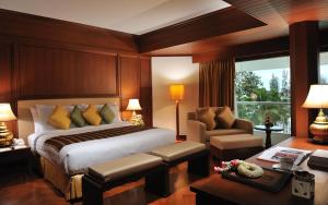 Кровать или кровати в номере Aonang Villa Resort I Beach Front