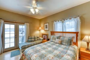 a bedroom with a bed and a window at The Timberwolf on Cotton Ranch in Eagle