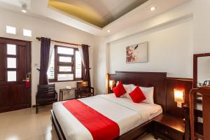 Giường trong phòng chung tại Ori Hotel