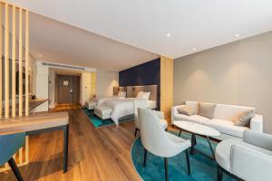 Posezení v ubytování Holiday Inn Express Yichang Riverside by IHG