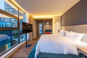 Postel nebo postele na pokoji v ubytování Holiday Inn Express Yichang Riverside by IHG