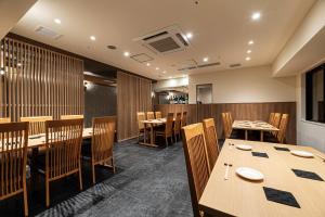A restaurant or other place to eat at PROSTYLE RYOKAN TOKYO ASAKUSA