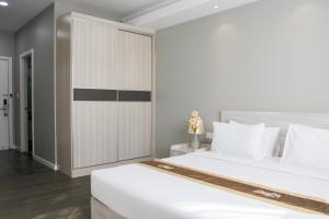 Letto o letti in una camera di Cambodian Country Club