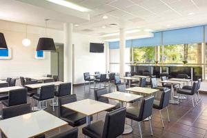 Reštaurácia alebo iné gastronomické zariadenie v ubytovaní ibis budget Wrocław Stadion