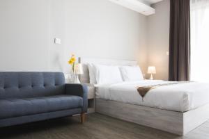 Letto o letti in una camera di Cambodian Country Club