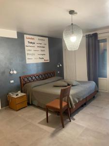 Postel nebo postele na pokoji v ubytování Hotel Villa Archirafi