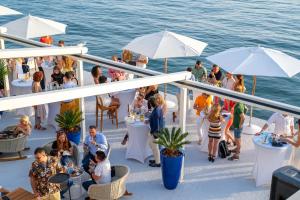 a party on the deck of a cruise ship at Dukley Hotel & Resort in Budva