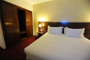 Letto o letti in una camera di Rive Hotel