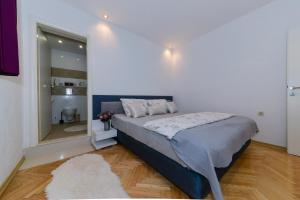 Postel nebo postele na pokoji v ubytování Family & pet friendly apartment IVA