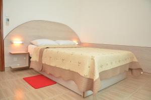 Ένα ή περισσότερα κρεβάτια σε δωμάτιο στο Residence Coin De Mire