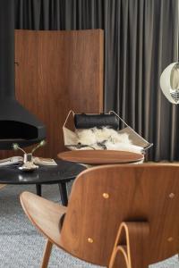 Ein Sitzbereich in der Unterkunft briig boutique hotel