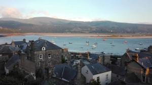 a view of a harbor with boats in the water at Penbryn Holidays, Barmouth in Barmouth