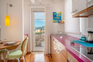 Η κουζίνα ή μικρή κουζίνα στο Piccolo Grand Hotel