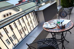 Balkón nebo terasa v ubytování Danubia Gate Hotel