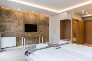 Posteľ alebo postele v izbe v ubytovaní Royal Hill Residence