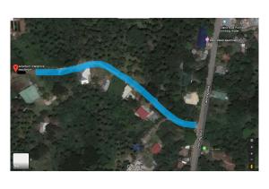 una mappa di una strada con sentiero blu di Selectum Mangrove Resort a Panglao