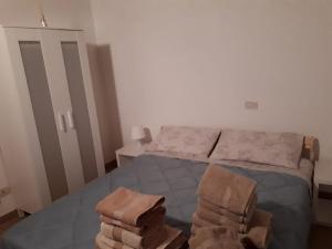 A bed or beds in a room at Agriturismo iL CASONE