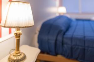 Łóżko lub łóżka w pokoju w obiekcie Residenza Reale