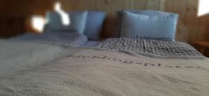 A bed or beds in a room at Hochleiten-Gut