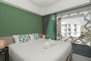 Кровать или кровати в номере Yanud Residence