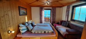 A bed or beds in a room at Hochleiten-Gut